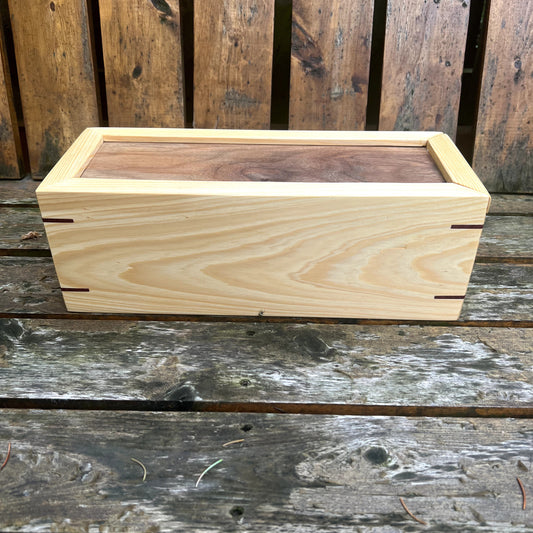 Wooden box on a wooden surface with a rustic background