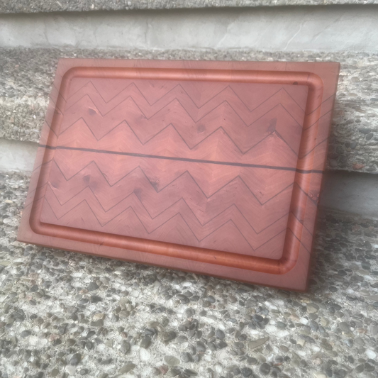 The Remy Martin Cutting Board