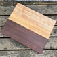 “Scandinavian-style cutting board with roasted maple and cherry contrast — The Reykjavík by Shamrock Designs.”